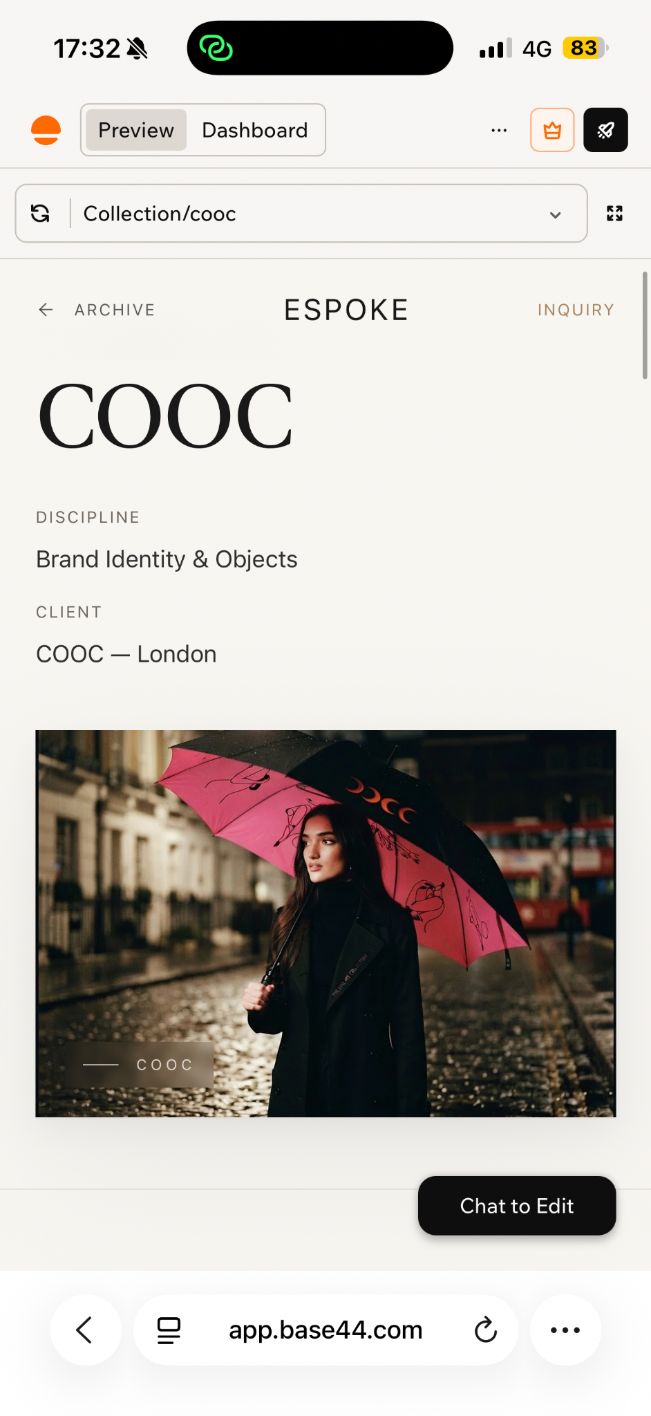 COOC black and pink umbrella on a London street